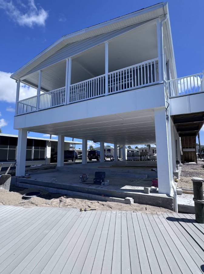 Elevated white residential structure